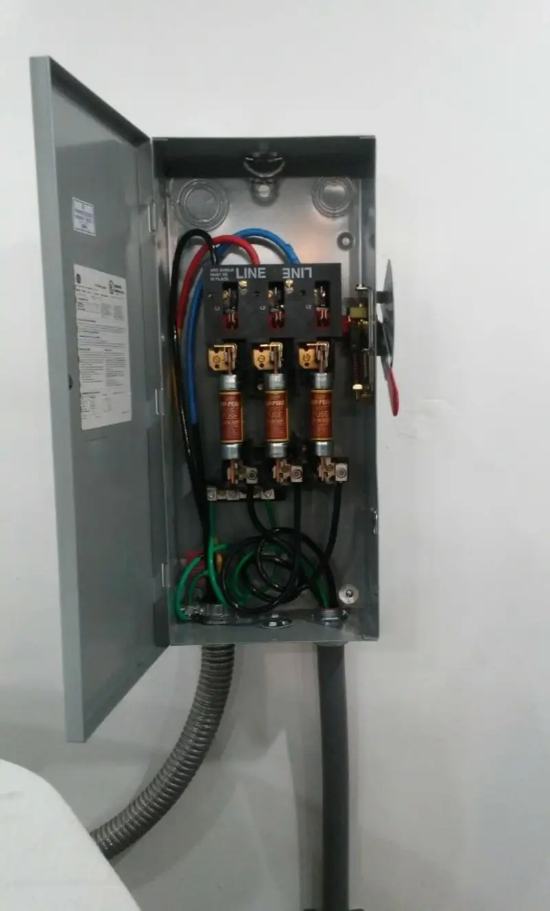 Three-phase disconnect switch installed for Smoke Detector Installation in Commercial Point